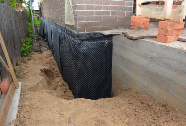 SJ Waterproofing Pros technician performing targeted Sump Pump Installation assessment in Edinburgh, IN